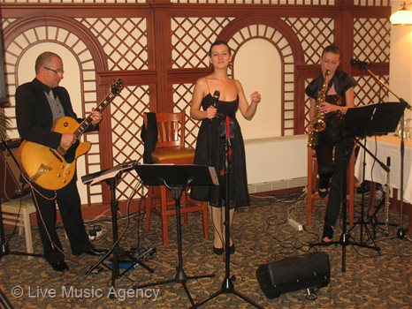 Jazz trio saxophone guitar vocal | фото: livemusicagency.com