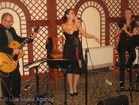 Jazz trio saxophone guitar vocal | фото: livemusicagency.com
