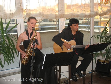 Saxophone and guitar duo Founding of Business Club HOLCIM | photo: livemusicagency.com