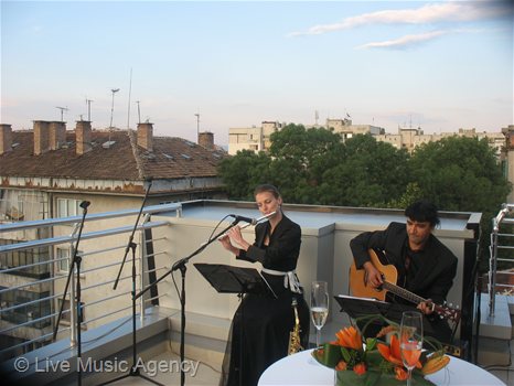 Saxophone and guitar duo Official Cocktail | photo: livemusicagency.com