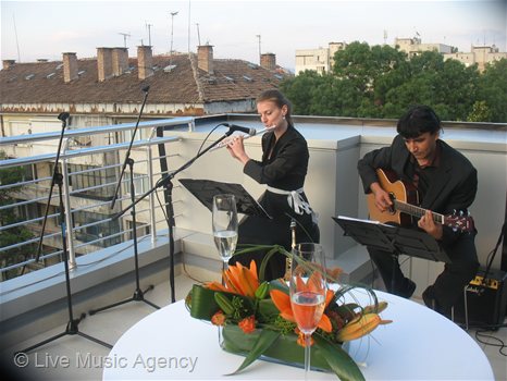 Saxophone and guitar duo Official Cocktail | photo: livemusicagency.com